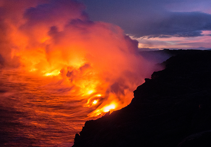 Lava meeting the ocean at Kīlauea, Hilo, United States. Photo by Mandy Beerley, Unsplash.